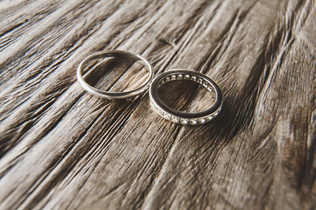 wedding rings on wood